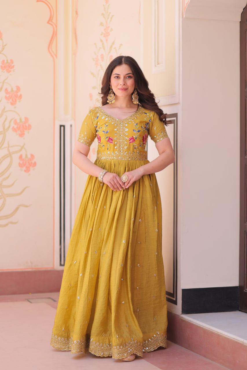 Mustard Yellow Gold Crush gown with zari, sequins, and multi-thread embroidery, featuring V-neck and short sleeves – perfect for weddings and festive occasions